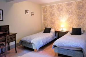 Maisons de vacances Grand gite dans les communs d-un Chateau : photos des chambres