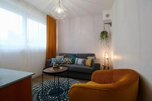 Appartements Le Retro de la Gare - FloBNB : photos des chambres
