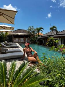 EHOA NYANYI BEACH Boutique Hotel - In front of entrance to NUANU