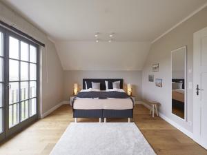 Reetland am Meer - Ihre Superior Reetdachvilla E28 - Zwei Schlafzimmer, Kamin & pure Wohlfühlatmosphäre