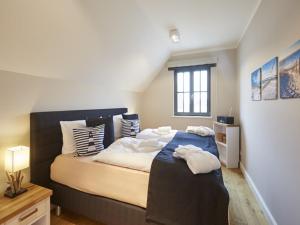 Reetland am Meer - Ihre Superior Reetdachvilla E28 - Zwei Schlafzimmer, Kamin & pure Wohlfühlatmosphäre