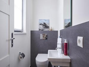 Reetland am Meer - Ihre Superior Reetdachvilla E28 - Zwei Schlafzimmer, Kamin & pure Wohlfühlatmosphäre