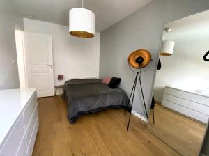 Appartements Un jardin en ville : photos des chambres