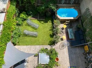 Appartements Un jardin en ville : photos des chambres