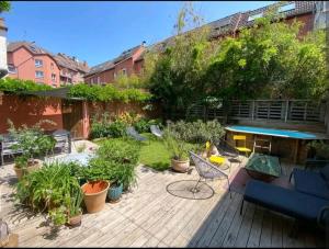 Appartements Un jardin en ville : photos des chambres