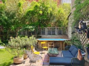 Appartements Un jardin en ville : photos des chambres