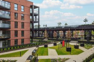 Sienna Grobla Apartment with View of the Motława Terrace & Sauna, Gym by Noclegi Renters