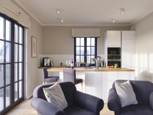 Reetland am Meer - LuxusPlus Reetdachvilla mit 4 Schlafzimmern, Außensauna, Loungebereich und Kamin G07