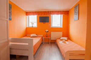 Wynajem apartamentów i pokoi.