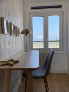 Appartements Le Central - Studio avec vue mer : photos des chambres