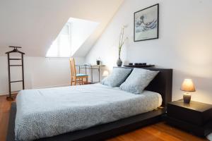 Appartements EXIGEHOME - T3 centre-ville proche de Paris la Defense, Champs Elysee : photos des chambres