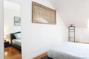 Appartements EXIGEHOME - T3 centre-ville proche de Paris la Defense, Champs Elysee : photos des chambres