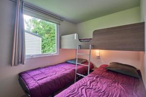 Campings Mobil Home 4 personnes 201 : photos des chambres