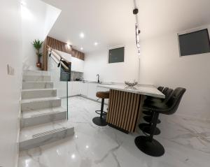 Maison neuve et contemporaine, alliant modernité et situation stratégique à 12km de Paris et 8km de Versailles