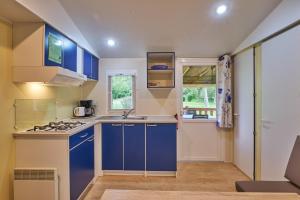 Campings Mobil Home 4 personnes 202 : photos des chambres