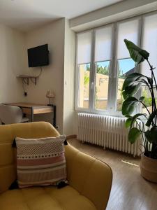 Appartements Le Nid - hebergement cosy : photos des chambres