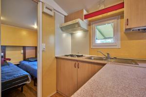 Campings Mobil Home 5 personnes 210 : photos des chambres