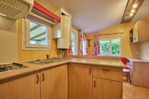 Campings Mobil Home 5 personnes 209 : photos des chambres