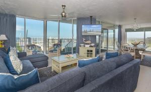 Ocean Condo 104 ~ Ground Floor Corner Condo with wrap around balcony Walk right out to Pool