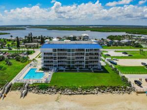 Ocean Condo 104 ~ Ground Floor Corner Condo with wrap around balcony Walk right out to Pool