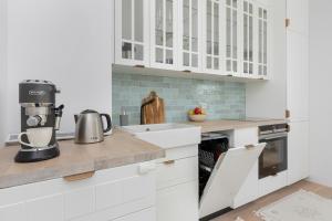 Blue Sky - Botanica Jelitkowo by OneApartments