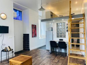 Appartements Studio Saint Denis : photos des chambres