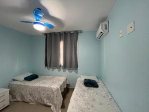 Edf Gil Nogueira-Praia Morro-Guarapari-3º Andar-APTO FTE-SOL MANHA-Piscina-Sauna-02 quartos com Ar -TV Tela Plana-Wi-Fi-Varanda Gourmet -Tela de Proteção - Purificador Água-Airfray-Dois elevadores-01 Garagem-Portaria 24 horas-50 mts da Praia do M