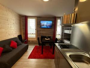 Appartements Le Chaleureux Cocon Rouge : photos des chambres