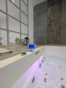 Appartements My'Deting - Jacuzzi : photos des chambres