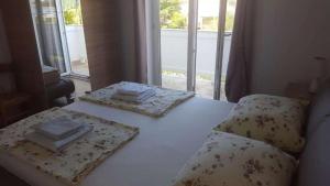 Apartments by the sea Banjol, Rab - 23210