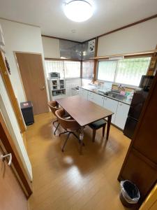 In front of Nikko Station 3BR Big Yard House