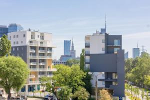 Nowoczesne Apartamenty z Balkonem Kolejowa NU Warszawa Wola by Noclegi Renters