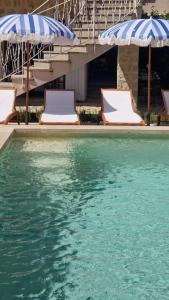 Maisons de vacances Magnifique maison provencale haut standing avec piscine, jardins, garages fermes : photos des chambres