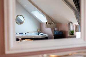 Appartements Le Cocon chambre avec Jacuzzi privatif Normandie : photos des chambres