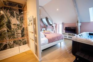 Appartements Le Cocon chambre avec Jacuzzi privatif Normandie : photos des chambres