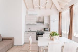 Bagno Conte Rosso - Beachfront Suites & Apartments