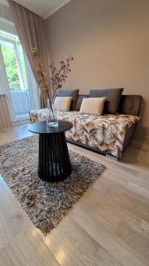 Apartamentai su balkonu