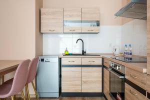 Pogonowskiego Beige Apartment by BookingHost