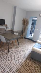 Maisons de vacances La petite auxiloise : photos des chambres