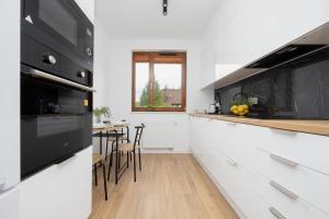 Nowoczesny Apartament WorkSpace Solipska z Parkingiem by Noclegi Renters