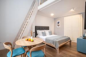 Deluxe Queen Room with Two Queen Beds room in Clouds Boutique Guesthouse