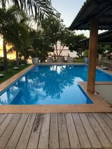 Chácara Por do Sol Beira Lago - Caveiras