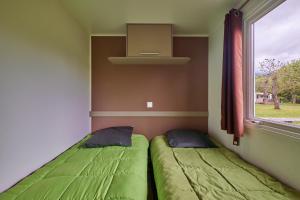 Campings Mobil Home 6 personnes 205 : photos des chambres