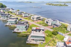 Lake House with dock at Lake Veere, Zeeland