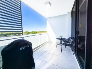 Relaxing 1BR w Pools & SPA, Gym in Olympic Park