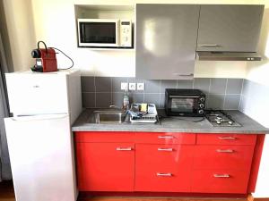 Appartements Studio GLYCINE : photos des chambres