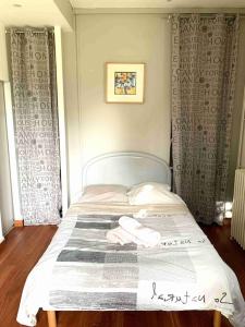 Appartements Studio GLYCINE : photos des chambres