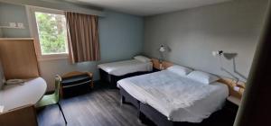 Hotels ibis Strasbourg Aeroport Le Zenith : photos des chambres