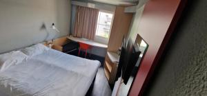 Hotels ibis Strasbourg Aeroport Le Zenith : photos des chambres