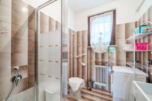 Casa Maria - trilocale con patio, garage e WiFi